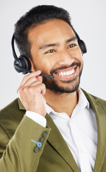 Customer service specialist with a headset providing support for cardiology billing, coding, and reimbursement inquiries