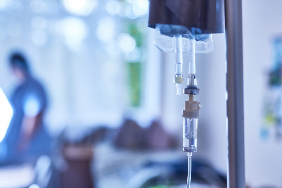 IV chemotherapy infusion drip in an oncology treatment suite