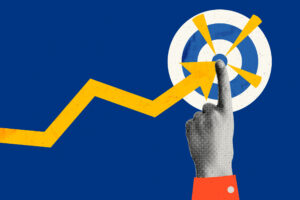 Illustration of a hand pointing at the center of a target, with an upward-trending arrow intersecting the bullseye, symbolizing business growth, focus, and achieving goals.